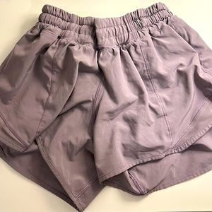 Lululemon purple hotty hot in 4 inch size 2